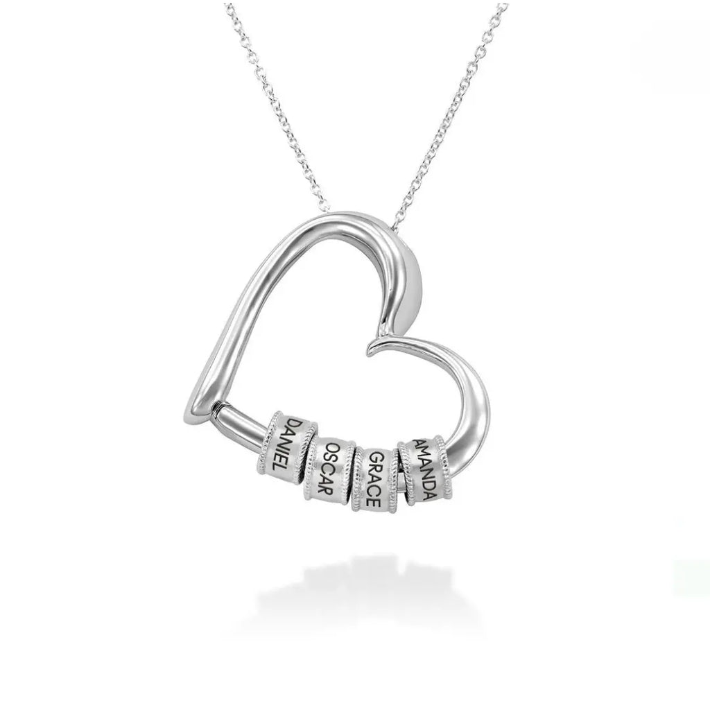 Charming Heart Necklace - With Engraved Rings Etched in Embrace